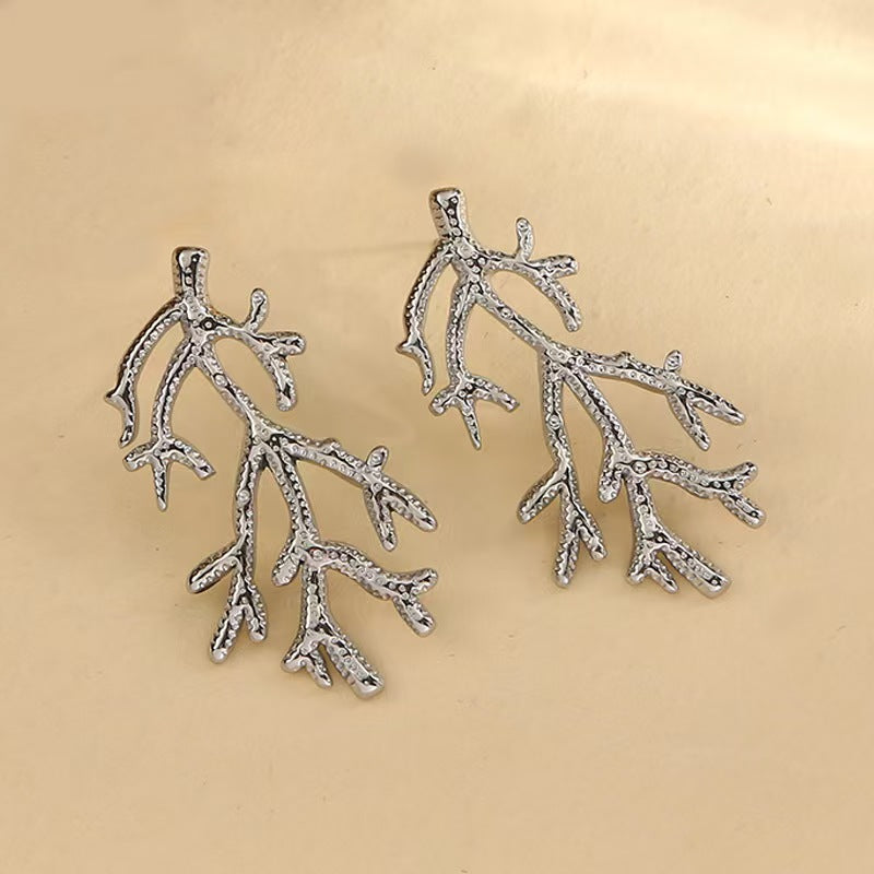Aretes inox chapado 250
