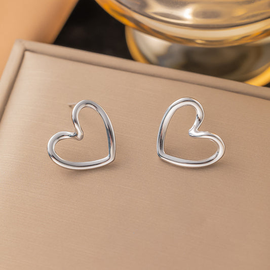 Aretes inox chapado 555