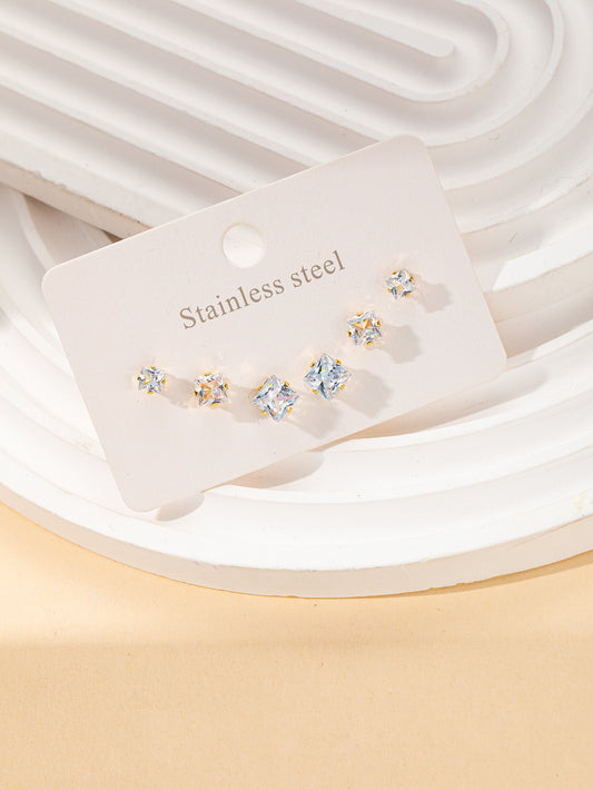 Aretes inox chapado 123