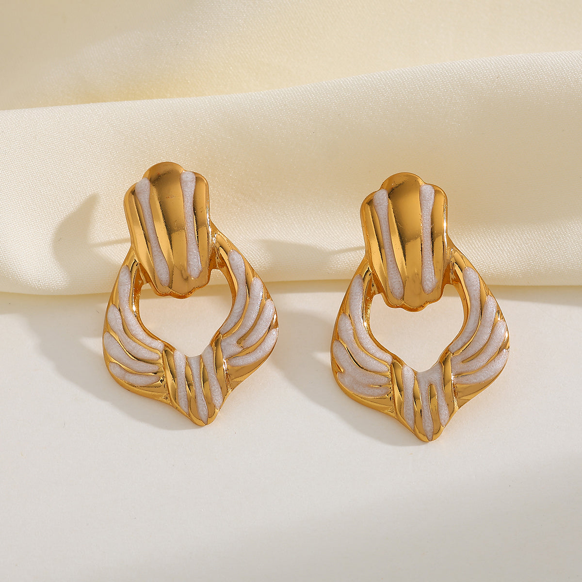 Aretes inox chapado 497
