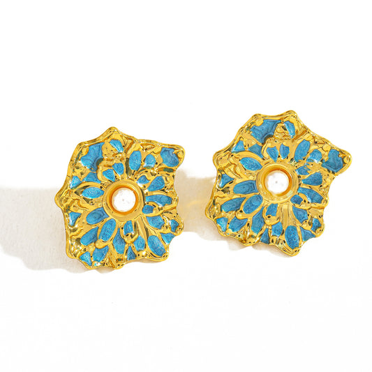 Aretes inox chapado 23