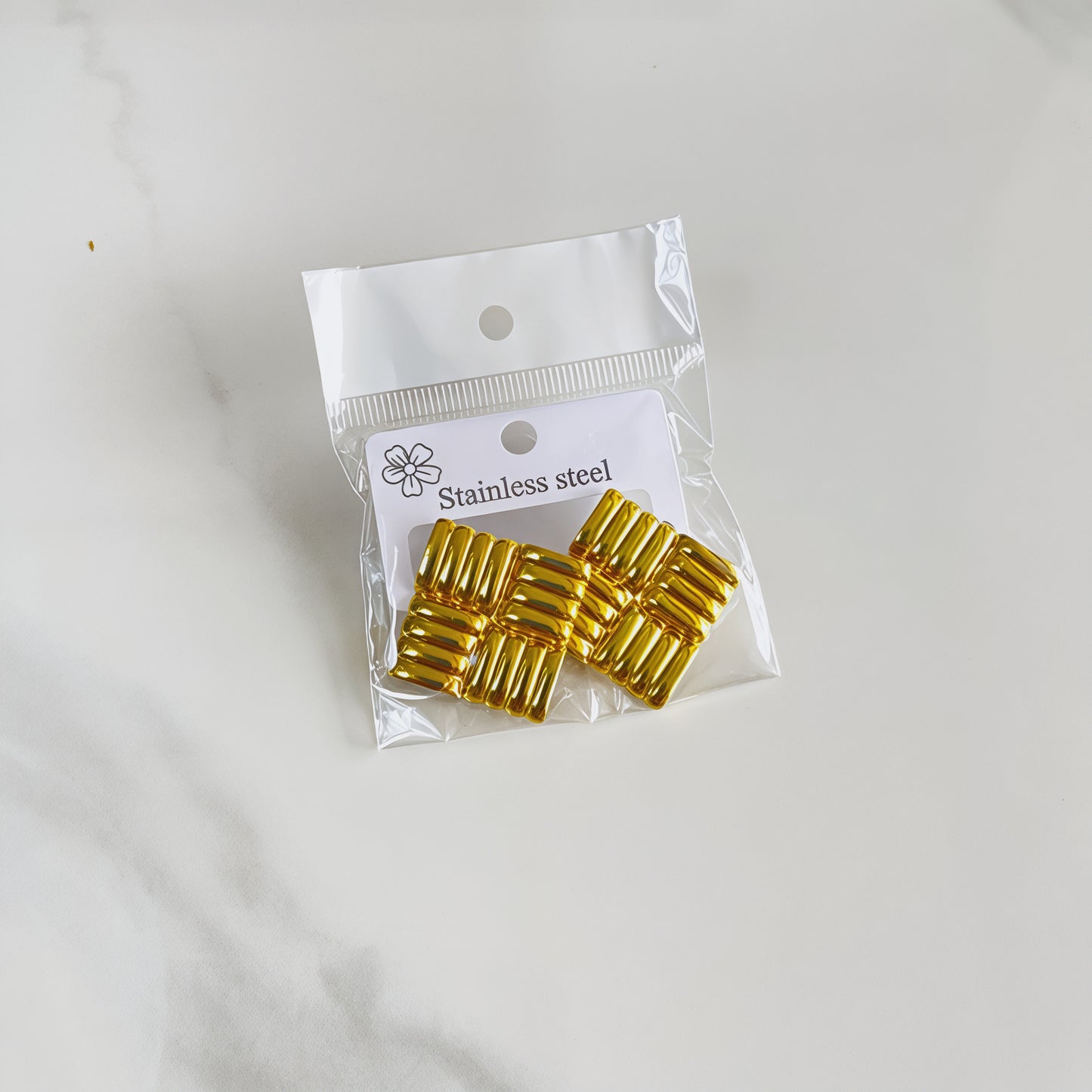 Aretes inox chapado 273