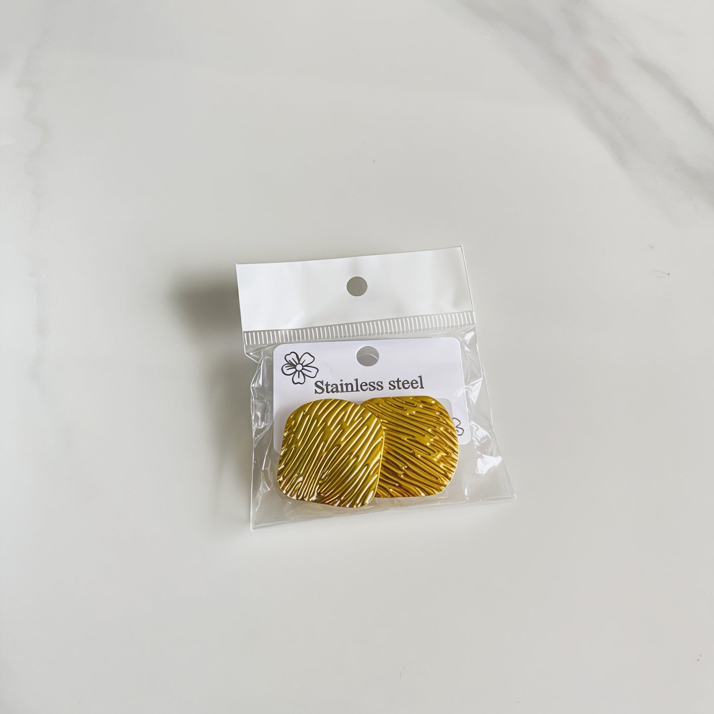 Aretes inox chapado 275