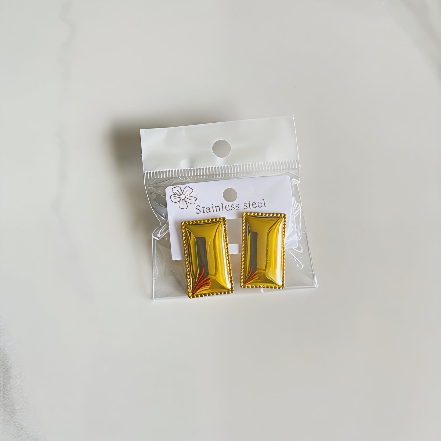 Aretes inox chapado 295
