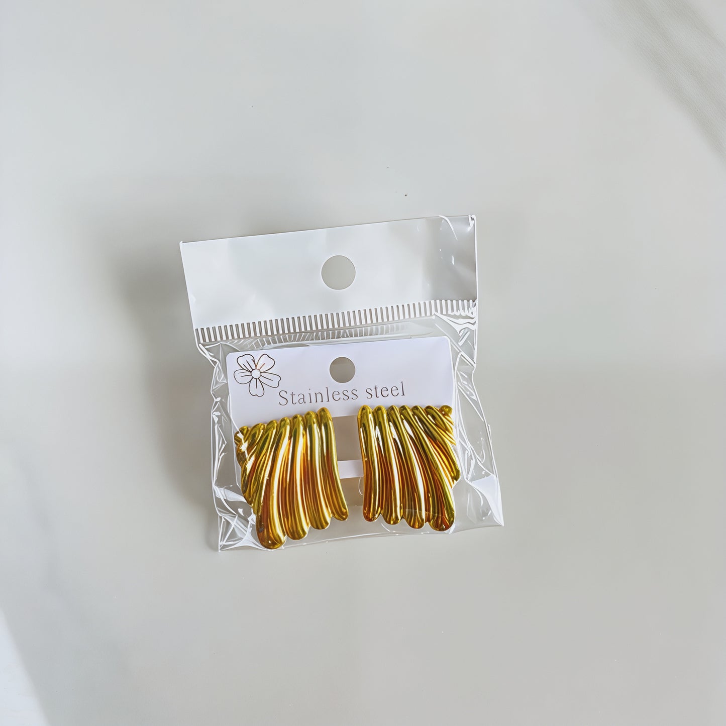 Aretes inox chapado 293