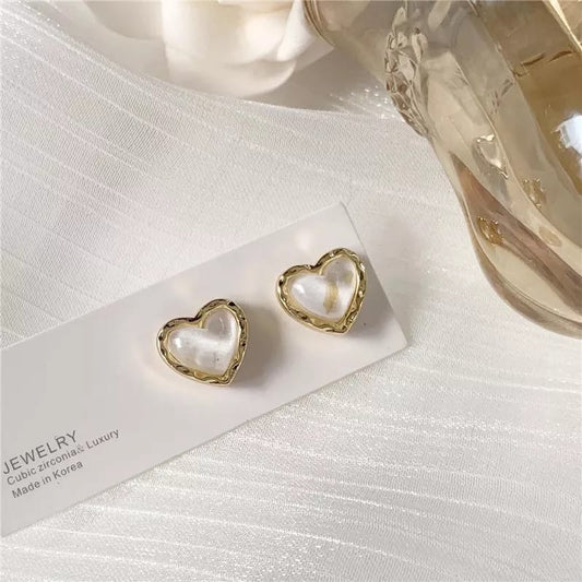 Aretes 77