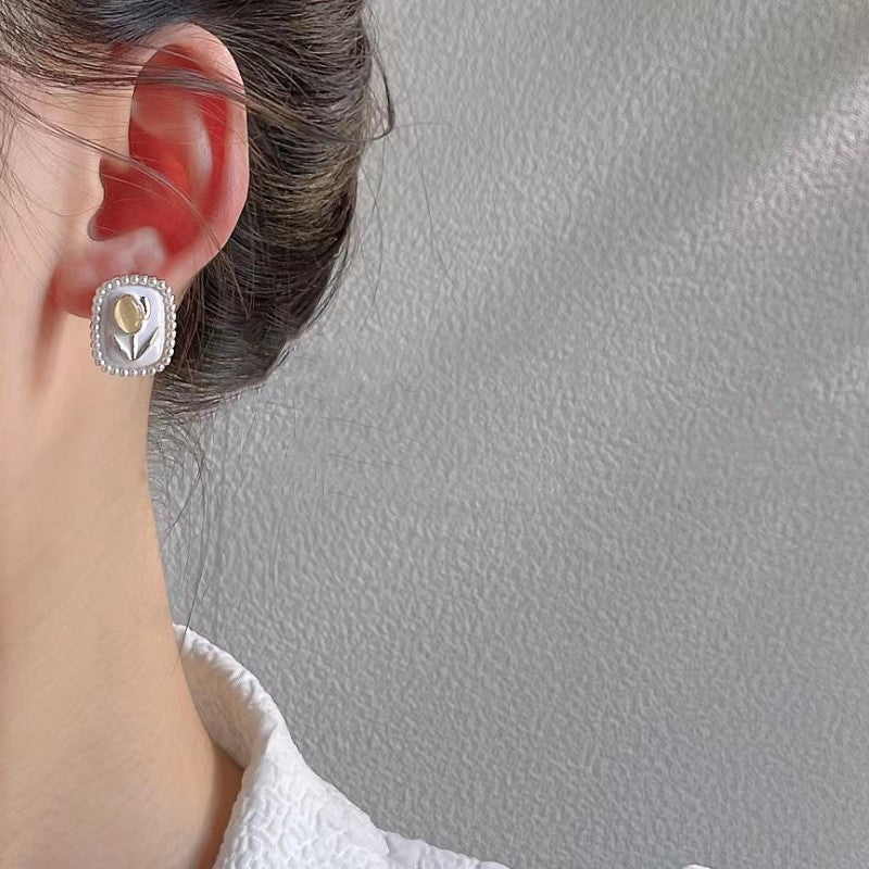 Aretes 107